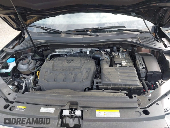 2023 Volkswagen Tiguan S with VIN 3VVRB7AX6PM108735, listed as a IAAI auction lot 42108217 with 13,279 mi miles and . Bid and sale history available at DreamBid. Image 10.