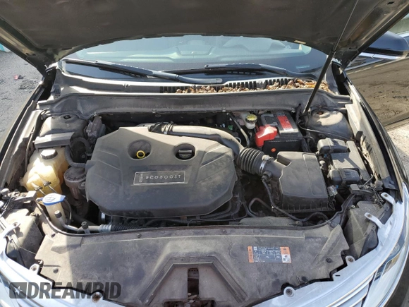 2016 Lincoln MKZ z VIN 3LN6L2J90GR613557, wystawiony jako Copart lot #48895725 z przebiegiem 101 515 mil mil oraz Szkoda całkowita • Salvage title. Historia ofert i sprzedaży dostępna na DreamBid. Obrazek 12.