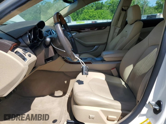2012 Cadillac CTS Luxury with VIN 1G6DE5E5XC0139354, listed as a Copart auction lot 55996785 with 99,655 mi miles and Salvage title. Bid and sale history available at DreamBid. Image 7.