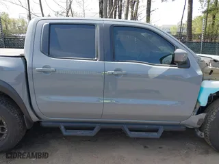 2023 Nissan Frontier PRO-4X with VIN 1N6ED1EKXPN674662, listed as a IAAI auction lot 42001624 with 24,928 mi miles. Bid and sale history available at carsss.com. Image 14.