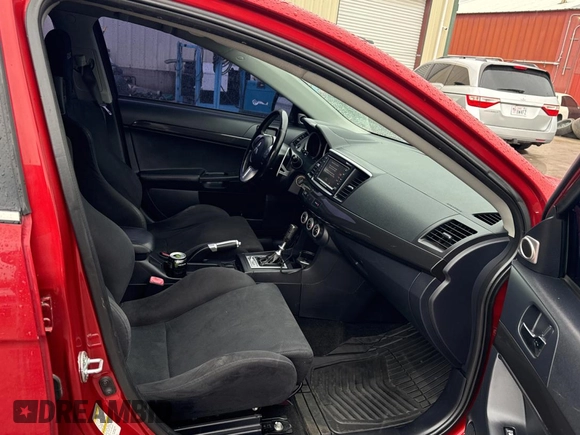 2008 Mitsubishi Lancer Evolution MR z VIN JA3AW56V78U051033, wystawiony jako Copart lot #82855894 z przebiegiem 92 726 mil mil oraz Szkoda całkowita • Salvage title. Historia ofert i sprzedaży dostępna na DreamBid. Obrazek 5.