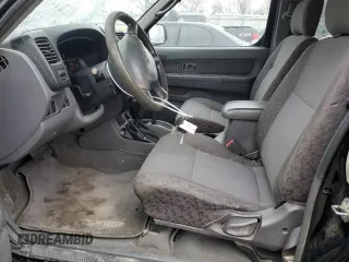 2001 Nissan Xterra XE z VIN 5N1ED28Y31C531253, wystawiony jako Copart lot #49736505 z przebiegiem 318 998 mil mil oraz Szkoda całkowita • Salvage title. Historia ofert i sprzedaży dostępna na DreamBid. Obrazek 7.
