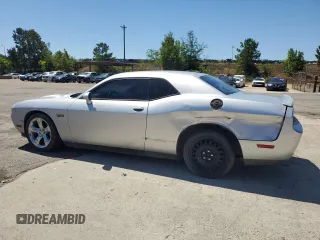 2012 Dodge Challenger R/T z VIN 2C3CDYBT0CH259731, wystawiony jako Copart lot #58033035 z przebiegiem 142 427 mil mil oraz Czysty tytuł • Clean title. Historia ofert i sprzedaży dostępna na DreamBid. Obrazek 2.