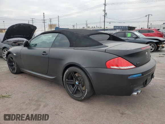 2009 BMW 6 Series M6 z VIN WBSEK935X9CY80091, wystawiony jako Copart lot #43348935 z przebiegiem 128 438 mil mil oraz Tytuł czysty. Historia ofert i sprzedaży dostępna na DreamBid. Obrazek 2.
