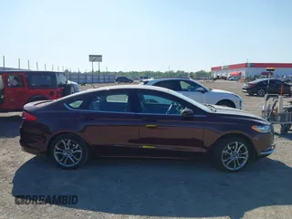 2017 Ford Fusion SE z VIN 3FA6P0H70HR198507, wystawiony jako IAAI lot #42033338 z przebiegiem 94 363 mil mil oraz . Historia ofert i sprzedaży dostępna na DreamBid. Obrazek 13.