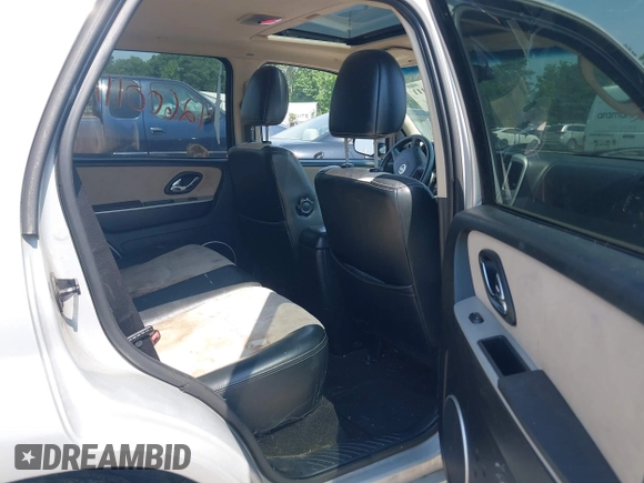 2006 Mercury Mariner Luxury с VIN 4M2CU57106DJ03167, выставлен на аукционе IAAI как лот 42600111 с пробегом 273 239 миль миль и . История ставок и продаж доступна на DreamBid. Изображение 8.