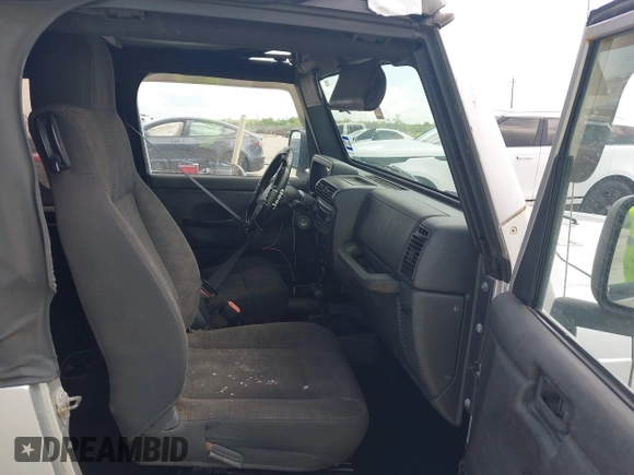 2005 Jeep Wrangler X with VIN 1J4FA39S75P321815, listed as a IAAI auction lot 42736150 with 141,914 mi miles and . Bid and sale history available at DreamBid. Image 5.