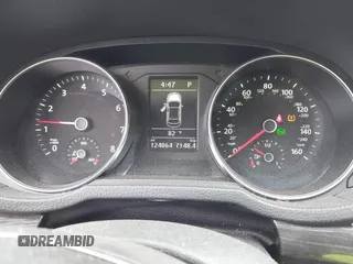 2016 Volkswagen Passat SE z VIN 1VWBT7A36GC007977, wystawiony jako IAAI lot #42433371 z przebiegiem 124 064 mil mil oraz . Historia ofert i sprzedaży dostępna na DreamBid. Obrazek 7.