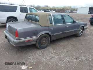 1992 Chrysler New Yorker z VIN 1C3XV66L3ND861794, wystawiony jako IAAI lot #41844564 z przebiegiem 68 016 mil mil oraz . Historia ofert i sprzedaży dostępna na DreamBid. Obrazek 4.