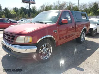 1999 Ford F-150 Work Series with VIN 1FTRF17W0XNB19833, listed as a IAAI auction lot 41993435 with 1 mi miles. Bid and sale history available at carsss.com. Image 2.