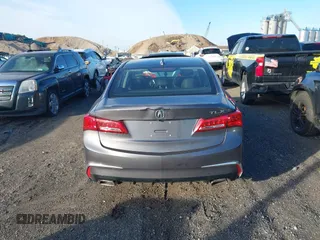 2019 Acura TLX with VIN 19UUB2F30KA002614, listed as a IAAI auction lot 41569334 with 96,320 mi miles and . Bid and sale history available at DreamBid. Image 15.