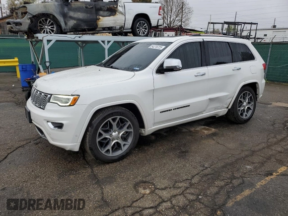 2019 Jeep Grand Cherokee Overland with VIN 1C4RJFCT7KC640527, listed as a Copart auction lot 54276725 with 282,202 mi miles and Salvage title. Bid and sale history available at DreamBid. Image 1.