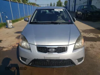 2011 Kia Rio with VIN KNADH4B32B6915275, listed as a Copart auction lot 71546484 with 297,998 mi miles and Salvage Title. Bid and sale history available at DreamBid. Image 5.