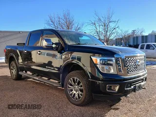 2017 Nissan Titan XD SL with VIN 1N6BA1F40HN561770, listed as a Copart auction lot 44038255 with 79,684 mi miles and Clean Title. Bid and sale history available at carsss.com. Image 1.