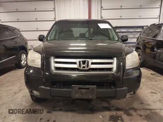 2007 Honda Pilot EX-L with VIN 5FNYF18677B017230, listed as a IAAI auction lot 41727853 with 257,527 mi miles and . Bid and sale history available at DreamBid. Image 13.