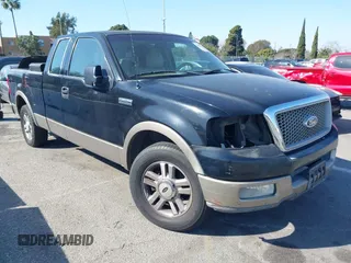 2004 Ford F-150 XL with VIN 1FTPX125X4NB03038, listed as a IAAI auction lot 41555454 with 218,770 mi miles. Bid and sale history available at carsss.com. Image 1.