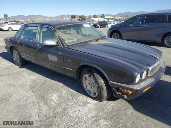 2002 Jaguar XJ VDP with VIN SAJDA24C52LF42702, listed as a Copart auction lot 41927545 with 0 mi miles and Salvage Title. Bid and sale history available at carsss.com. Image 4.