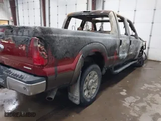 2015 Ford Super Duty F-250 SRW Lariat with VIN 1FT7W2B67FEC97712, listed as a IAAI auction lot 41828275 with 150,000 mi miles. Bid and sale history available at carsss.com. Image 4.