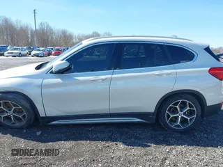 2019 BMW X1 xDrive28i with VIN WBXHT3C58K5N05523, listed as a IAAI auction lot 41752675 with 63,861 mi miles. Bid and sale history available at carsss.com. Image 14.