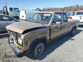 1987 Ford Ranger XL z VIN 1FTCR14A9HPA20066, wystawiony jako Copart lot #77643184 z przebiegiem 413 715 mil mil oraz Szkoda całkowita • Salvage title. Historia ofert i sprzedaży dostępna na DreamBid. Obrazek 1.