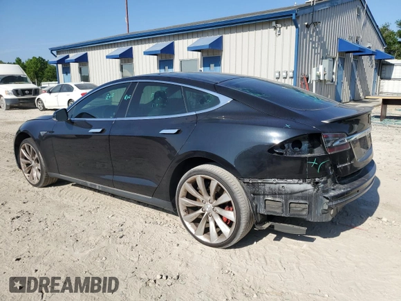 2015 Tesla Model S 85D with VIN 5YJSA1E48FF118749, listed as a Copart auction lot 54516035 with 115,380 mi miles and Salvage Title. Bid and sale history available at carsss.com. Image 2.