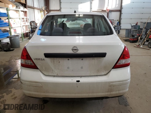2009 Nissan Versa 1.6 with VIN 3N1CC11E59L477417, listed as a Copart auction lot 88986075 with 0 mi miles and Salvage Title. Bid and sale history available at carsss.com. Image 6.