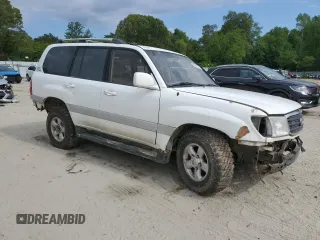 1999 Toyota Land Cruiser z VIN JT3HT05J5X0050404, wystawiony jako Copart lot #56066125 z przebiegiem 385 659 mil mil oraz Tytuł czysty. Historia ofert i sprzedaży dostępna na DreamBid. Obrazek 4.