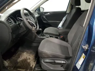 2018 Volkswagen Tiguan S with VIN 3VV0B7AX9JM034033, listed as a Copart auction lot 43441295 with 127,719 mi miles and Salvage Title. Bid and sale history available at carsss.com. Image 7.