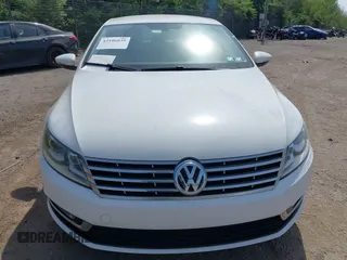 2013 Volkswagen CC Sport with VIN WVWBP7AN0DE523261, listed as a IAAI auction lot 42106039 with 136,105 mi miles. Bid and sale history available at carsss.com. Image 6.