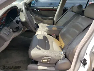 2003 Cadillac DeVille with VIN 1G6KD54Y73U139441, listed as a Copart auction lot 68880014 with 131,345 mi miles and Salvage Title. Bid and sale history available at carsss.com. Image 7.