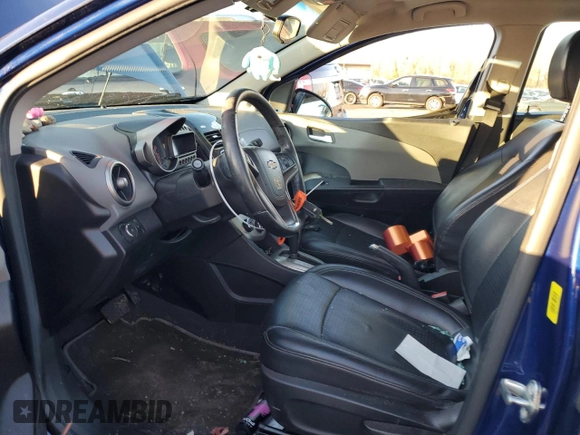 2014 Chevrolet Sonic LTZ with VIN 1G1JE5SB8E4219086, listed as a Copart auction lot 88990405 with 96,177 mi miles and Salvage Title. Bid and sale history available at carsss.com. Image 7.