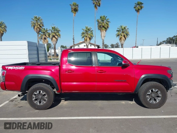2021 Toyota Tacoma SR z VIN 5TFCZ5AN8MX247421, wystawiony jako IAAI lot #42147910 z przebiegiem 94 467 mil mil oraz . Historia ofert i sprzedaży dostępna na DreamBid. Obrazek 14.