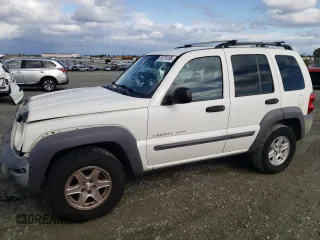 2002 Jeep Liberty Sport with VIN 1J4GL48K92W351230, listed as a Copart auction lot 51274195 with 211,716 mi miles and Salvage Title. Bid and sale history available at carsss.com. Image 1.