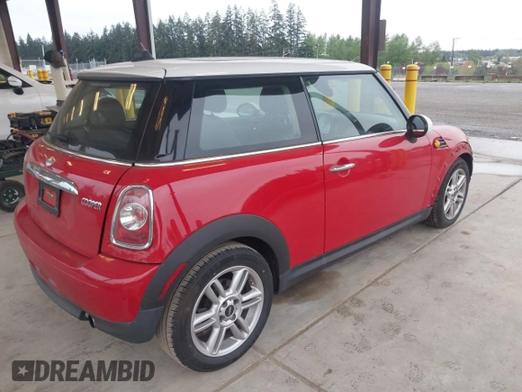 2012 MINI Hardtop with VIN WMWSU3C58CT262077, listed as a IAAI auction lot 42140178 with 70,099 mi miles and . Bid and sale history available at DreamBid. Image 4.