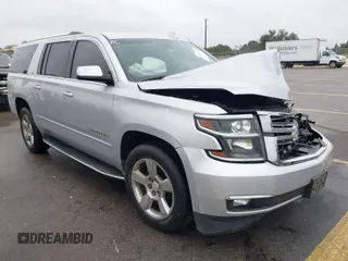 2015 Chevrolet Suburban LTZ with VIN 1GNSCKKC1FR507665, listed as a IAAI auction lot 41517753 with 162,604 mi miles. Bid and sale history available at carsss.com. Image 1.