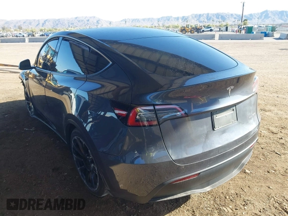 2022 Tesla Model Y Long Range with VIN 7SAYGDEE2NA017434, listed as a IAAI auction lot 41842025 with 35,164 mi miles and . Bid and sale history available at DreamBid. Image 3.