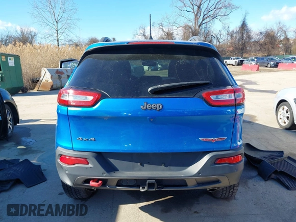2018 Jeep Cherokee Trailhawk with VIN 1C4PJMBX7JD507453, listed as a IAAI auction lot 41464420 with 100,369 mi miles and . Bid and sale history available at DreamBid. Image 16.
