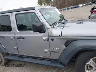 2018 Jeep Wrangler Unlimited Sport z VIN 1C4HJXDG1JW133543, wystawiony jako IAAI lot #41730522 z przebiegiem 81 667 mil mil oraz . Historia ofert i sprzedaży dostępna na DreamBid. Obrazek 13.