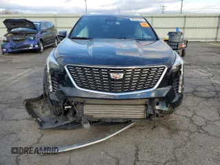 2021 Cadillac XT4 AWD Premium Luxury with VIN 1GYFZDR4XMF016846, listed as a Copart auction lot 82963704 with 44,063 mi miles and Salvage Title. Bid and sale history available at carsss.com. Image 5.