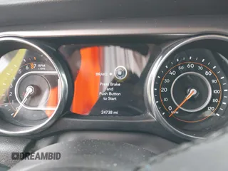 2023 Jeep Gladiator Sport S with VIN 1C6HJTAG1PL576760, listed as a IAAI auction lot 42106618 with 24,738 mi miles and . Bid and sale history available at DreamBid. Image 7.