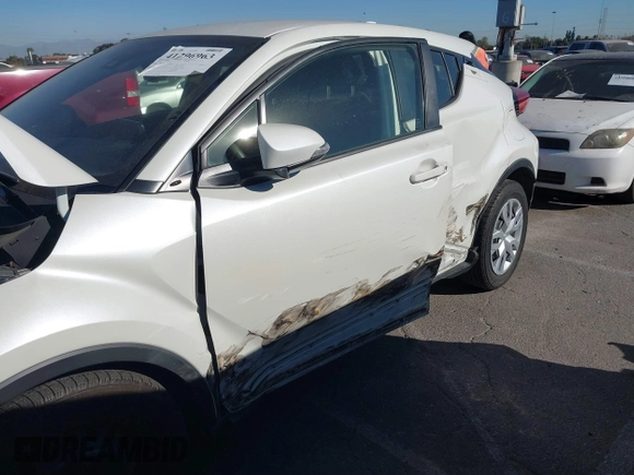 2019 Toyota C-HR XLE with VIN JTNKHMBX4K1058916, listed as a IAAI auction lot 41296963 with 113,290 mi miles. Bid and sale history available at carsss.com. Image 6.