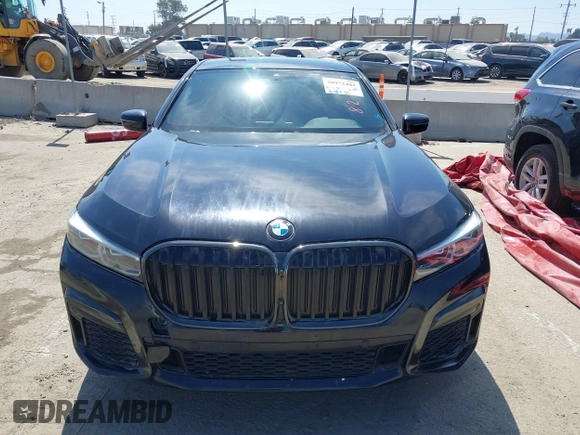 2022 BMW 7 Series 740i with VIN WBA7T2C07NCG88615, listed as a IAAI auction lot 39972481 with 76,169 mi miles. Bid and sale history available at carsss.com. Image 13.
