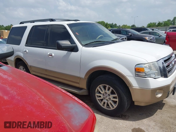 2014 Ford Expedition XLT with VIN 1FMJU1H51EEF11950, listed as a IAAI auction lot 42631473 with 215,572 mi miles and . Bid and sale history available at DreamBid. Image 13.