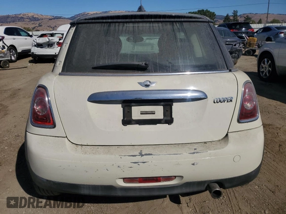 2013 MINI Hardtop with VIN WMWSU3C56DT688738, listed as a Copart auction lot 76593004 with 107,253 mi miles and Clean Title. Bid and sale history available at DreamBid. Image 6.