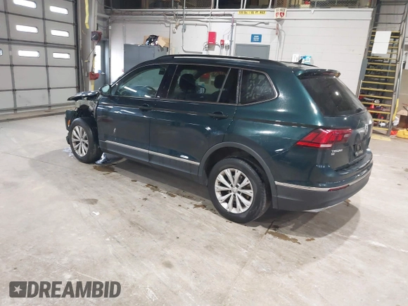 2018 Volkswagen Tiguan SEL with VIN 3VV2B7AX8JM113976, listed as a IAAI auction lot 42310576 with 100,319 mi miles and . Bid and sale history available at DreamBid. Image 3.