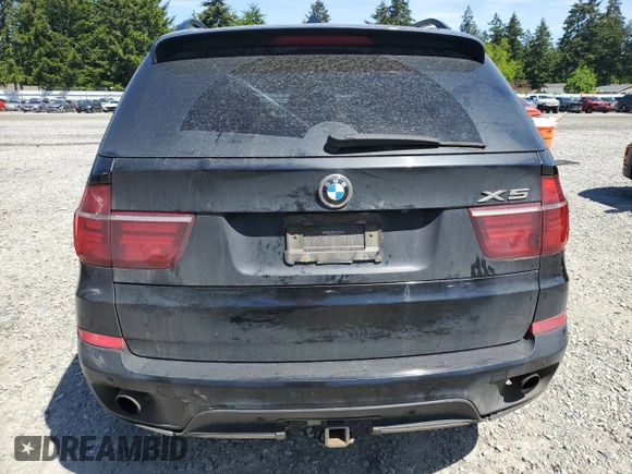 2012 BMW X5 35d z VIN 5UXZW0C59CL670242, wystawiony jako Copart lot #57638165 z przebiegiem 174 430 mil mil oraz Szkoda całkowita • Salvage title. Historia ofert i sprzedaży dostępna na DreamBid. Obrazek 6.