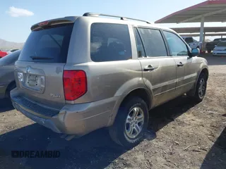 2005 Honda Pilot EX-L with VIN 5FNYF18585B046529, listed as a IAAI auction lot 41721911 with 223,266 mi miles. Bid and sale history available at carsss.com. Image 4.