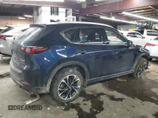 2023 Mazda CX-5 2.5 S Premium Package with VIN JM3KFBDMXP0196966, listed as a Copart auction lot 41927495 with 19,687 mi miles and Salvage Title. Bid and sale history available at carsss.com. Image 3.