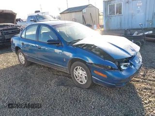 2002 Saturn SL z VIN 1G8ZF52802Z134506, wystawiony jako IAAI lot #41461865 z przebiegiem 210 886 mil mil oraz . Historia ofert i sprzedaży dostępna na DreamBid. Obrazek 1.