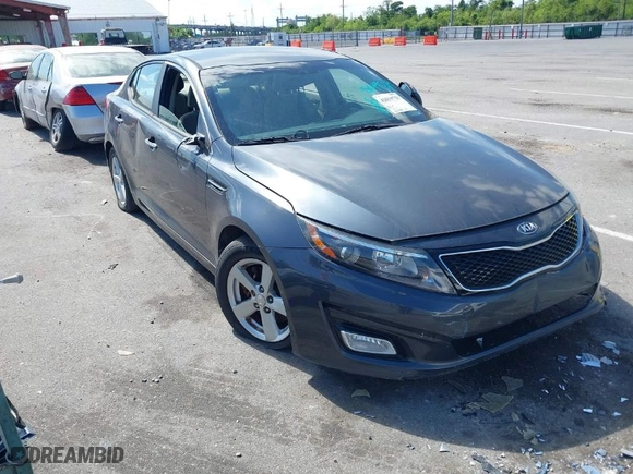 2015 Kia Optima LX with VIN KNAGM4A71F5634755, listed as a IAAI auction lot 42019729 with 101,064 mi miles. Bid and sale history available at carsss.com. Image 1.
